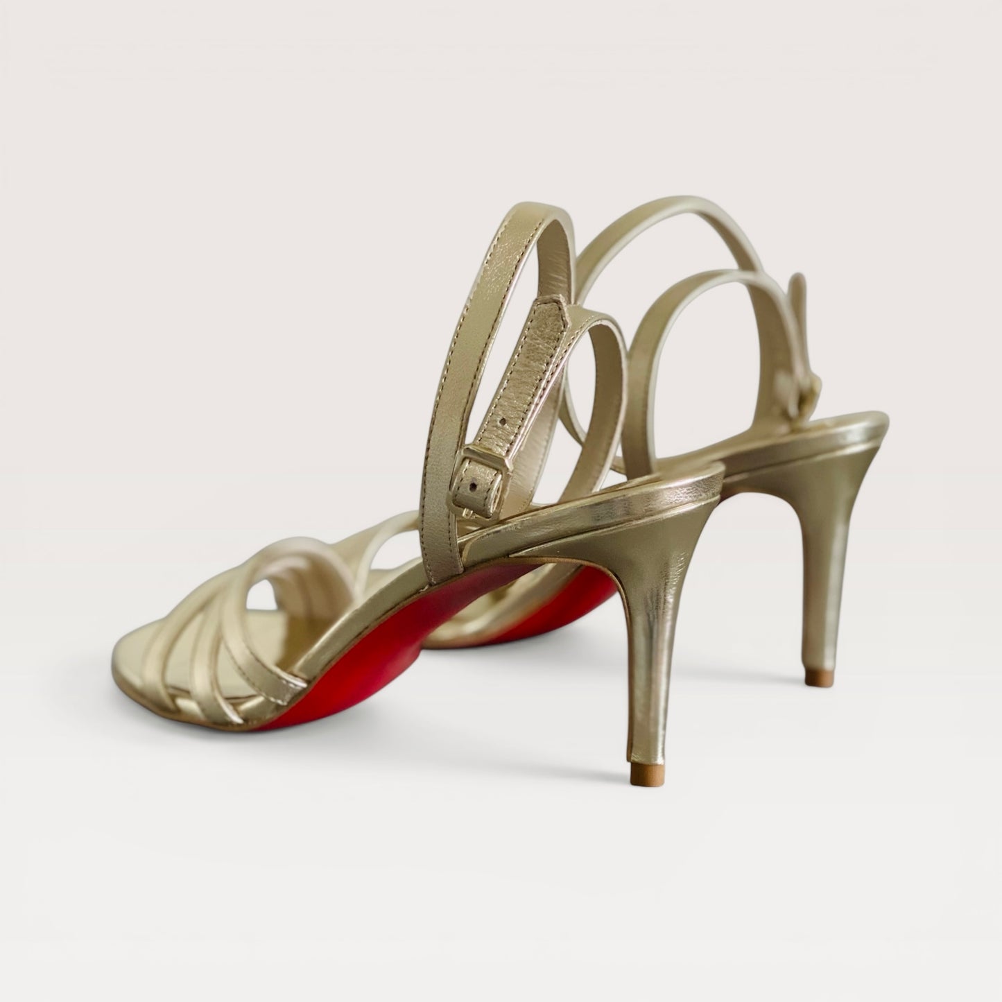 Sandalo pelle e specchio oro/platino h.7 cm.